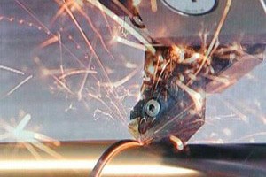 Sparks fly welding and cutting metal